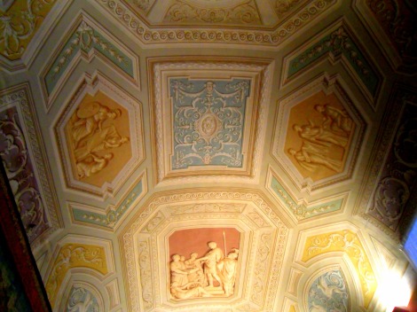 Ceiling that is flat but painted to look like 3D molding.